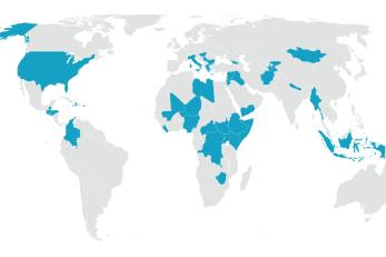 A map of the world with countries highlighted in blue indicating where mercy corps is operating. 